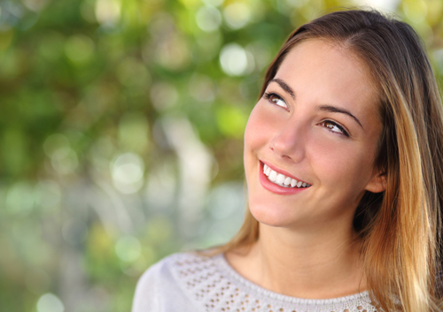 Lingual braces, woman smiling